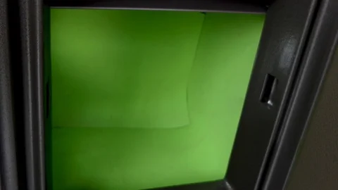 Close the safe door.  which is in the green background. 库存影片 118139708