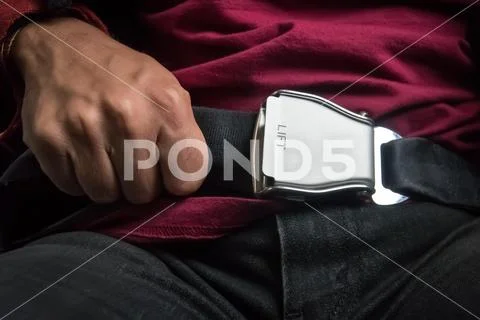 Close-up of a safety belt in the airplane Stock Photos