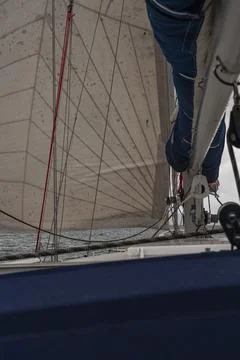 Close Up of Sailboat Deck and Rigging with Partially Unfurled Sail Stock Photos