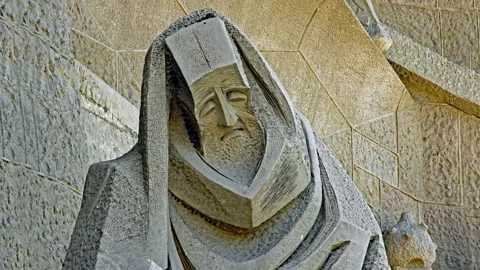 Close Up Of Saint Peter Statue On The Passion Facade Of Sagrada Familia Church Stock Footage 168262362