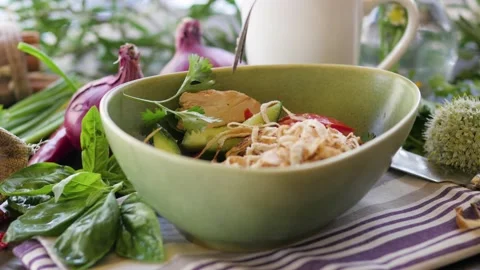 Close-up salad. eating salad with a fork in a restaurant close-up. Stock-Footage 148371441