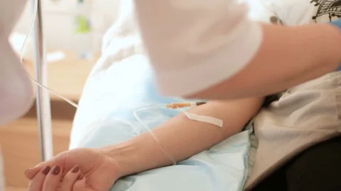 Close up saline solution drip for patient and infusion pump in hospital, with 스톡 동영상 75022884