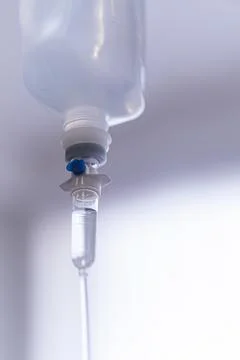 Close up saline solution, saline bag in emergency room at hospital. Stock Photos