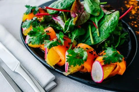 A close up of salmon salad on a table Stock Photos