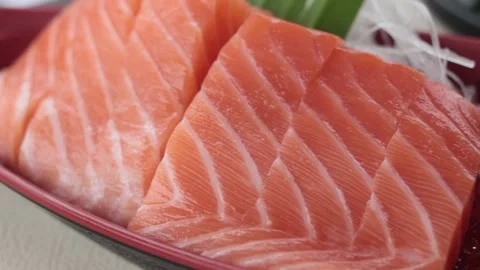 Close up Salmon sashimi with blur background. Stock Footage 157394241