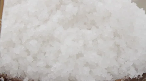Close-up of salt basket being filled Stock Footage 42395355