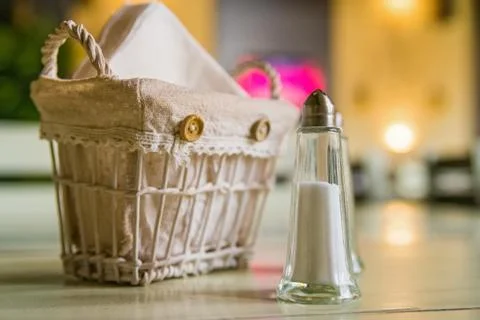 Close up of salt bottle on restaurant table Foto stock