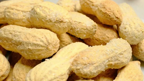 Close-up of salted fresh shelled peanuts Stock Footage 285520149