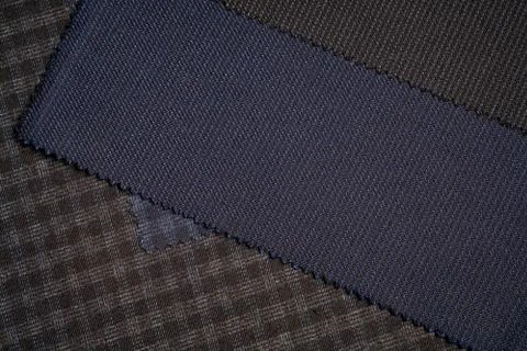 Close up sample fabric for interior design, material selection. Stock Photos