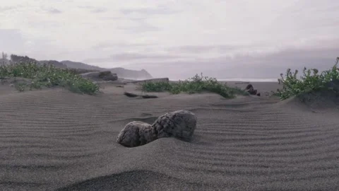 Close up of sand textures on beach as the wind blows and creates ripples in sand Video stock 147684565