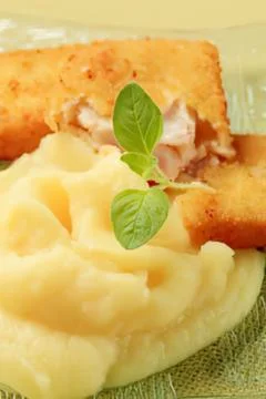 Close-up of sandwich with mashed potatoes and basil Stock Photos