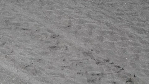 Close-up of sandy surface with motion blur and shadow shapes Stock Footage 308620655