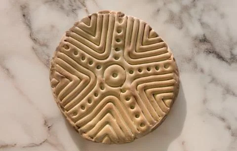 Close-up of Sardinian bread with the ancient stamp motif - Sa Pintadera 스톡 사진