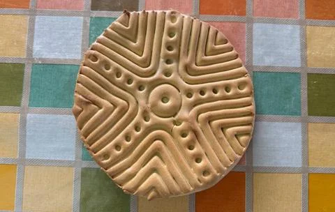 Close-up of Sardinian bread with the ancient stamp motif - Sa Pintadera Stock Photos