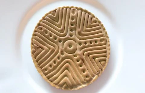 Close-up of Sardinian bread with the ancient stamp motif - Sa Pintadera Stock Photos