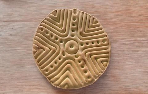 Close-up of Sardinian bread with the ancient stamp motif - Sa Pintadera Stock Photos