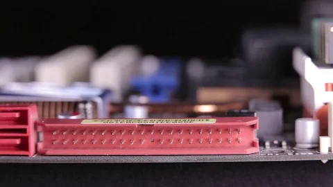 Close-up of a SATA controller slot, macro view, slider shot 動画素材 106999379