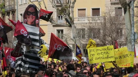 Close-up of a satirical giant puppet representing Esther Niubó Stock Footage 331169758