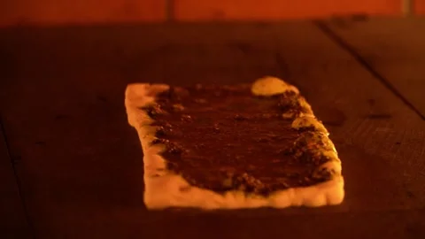 Close-Up of a Sauce Spread on a Wooden Surface Stock Footage 319950340