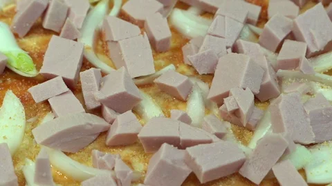 Close-up sausage cut into chunks lying on the white test Video stock 127110106