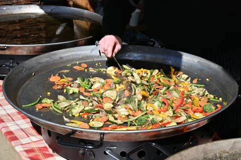 Close-up of Sauteing Mixed Vegetables in Large Catering Pan Stock Photos