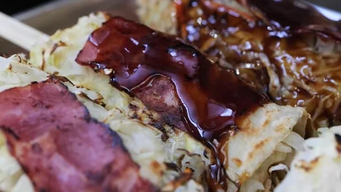 Close-Up of Savory BBQ Chicken and Bacon Taquitos Drizzled with Rich Barbecue Sa Stock Footage 331956268