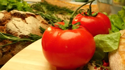 Close up savoury grilled chicken breasts with fresh tomatoes at the kitchen Stock Footage 107565311