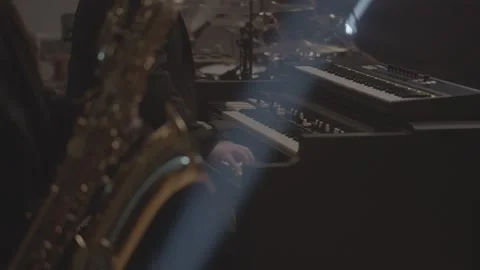 Close up of saxophonist performing in studio  Stock Footage 136336126