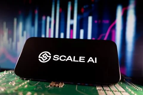 Close up of Scale AI logo on smartphone screen with financial chart background. Stock Photos