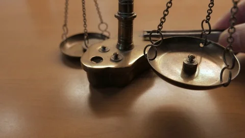 Close-up of a scale weighing a coin Stock Footage 109275889