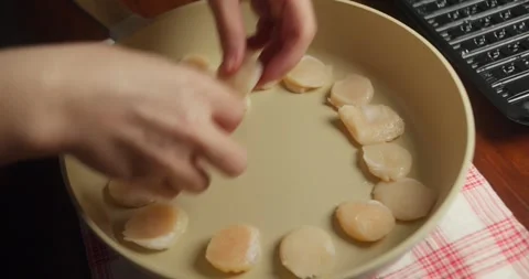 Close-up of scallops being turned to achieve an even golden sear, homemade Vídeo Stock 329520767