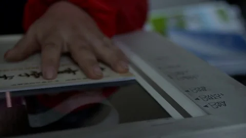 Close-up of a scanner or copier scanning a chinese book Stock Footage 77336966