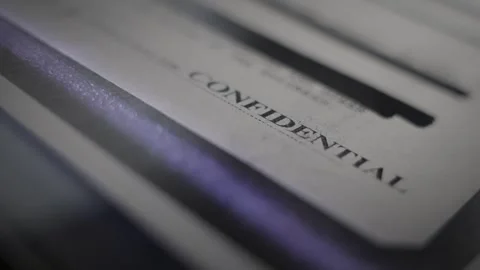 Close up on scanner tray as confidential document is scanned or photocopied Stockbeeldmateriaal 313296659