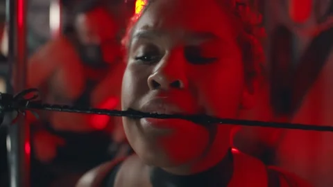 Close up of scared african submissive biting thin leather whip Vidéo 140341281