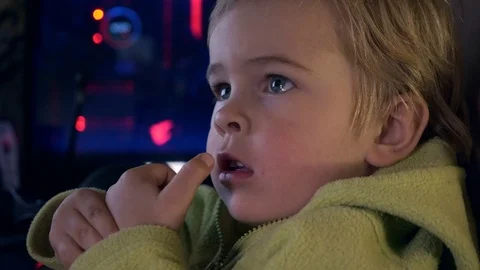 Close-up Scared Child's Face Watching Video on Computer Monitor Screen. Slow mot Stock Footage 116906167