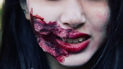 Close up of scary monster with grimace on face, cannibal wants to bite victim Stock Footage 59082819