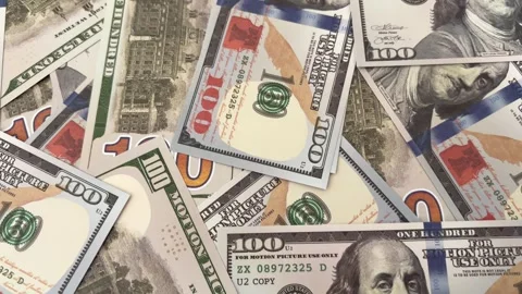 Close Up of Scattered One Hundred Dollar Bills Finance Background Stock Footage 337034313