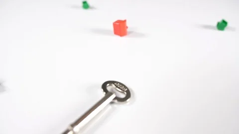 Close up of scattered red and green game house playing board game pieces Stock Footage 89190617