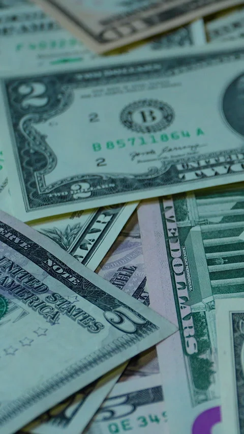 Close Up Of Scattered US Dollar Banknotes On Table Stock Footage 339971750