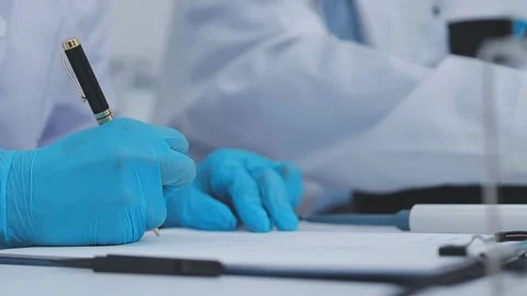 Close up scene of researcher examining alternative protein powder in steril.. Stock Footage 335925074