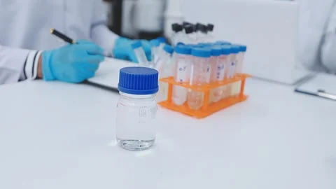 Close up scene of researcher examining alternative protein powder in steril.. Stock Footage 335925764