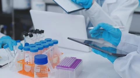 Close up scene of researcher examining alternative protein powder in steril.. Stock Footage 335925775