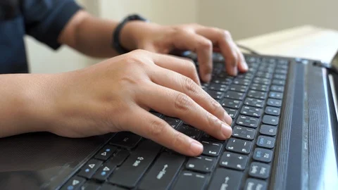 The close-up scene women's hands are typing keyboards during work from home.  Stock Footage 129801865