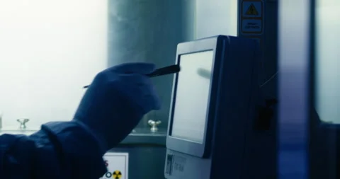 Close-up of a  scientist entering data in screen. Stock Footage 304644616