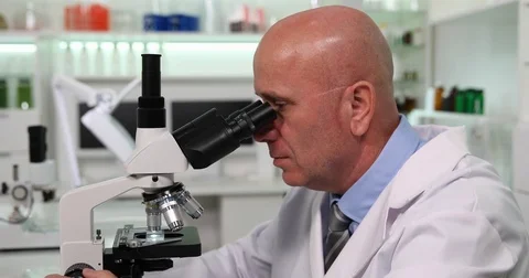 Close Up Scientist Face Chemist Presentation Working with Electronic Microscope Stock-Footage 83687853