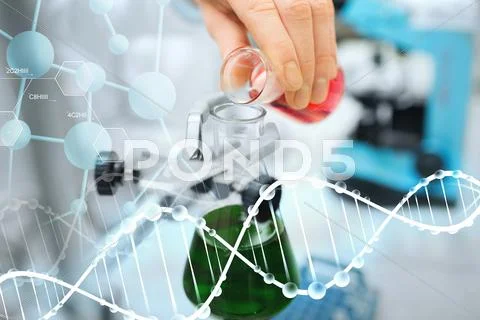 Close Up Of Scientist Filling Test Tubes In Lab