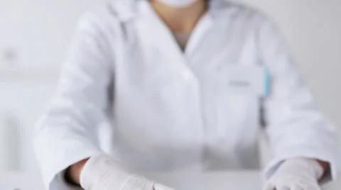 Close up of scientist with full beaker in lab Video stock 45187616