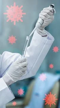 Close-up of a scientist in gloves and lab coat using a pipette on a test tu.. Stock Photos