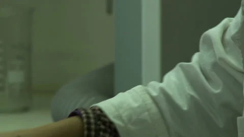 Close up. scientist marks the tubes with tests. Stock Footage 153815760