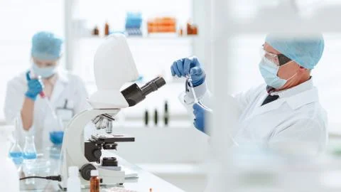 Close up. scientist microbiologist working in the laboratory. Stock Photos